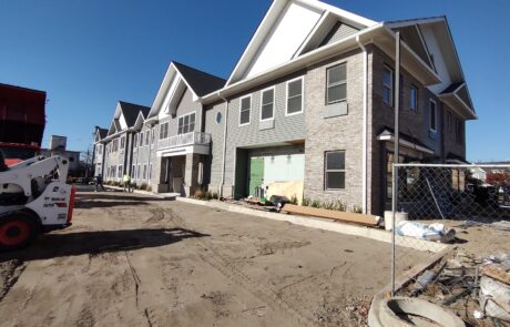 praiano-home-improvements-new-construction-bayshore-village-17 completed multi-unit exterior with siding and brick veneer