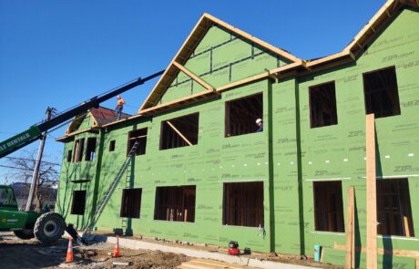 praiano-home-improvements-new-construction-bayshore-village-8 exterior walls sheathed and taped prior to windows and cladding
